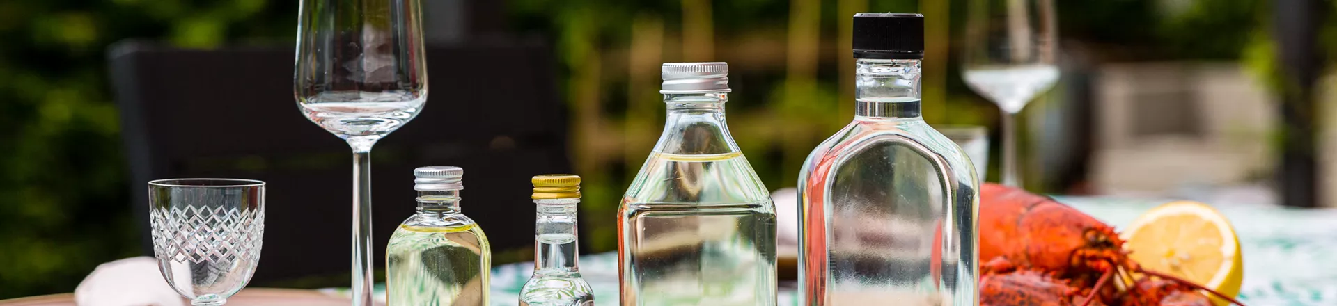 Store og små spritflasker i PET
